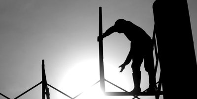 Worker on scaffolding