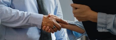 handshake between two business people